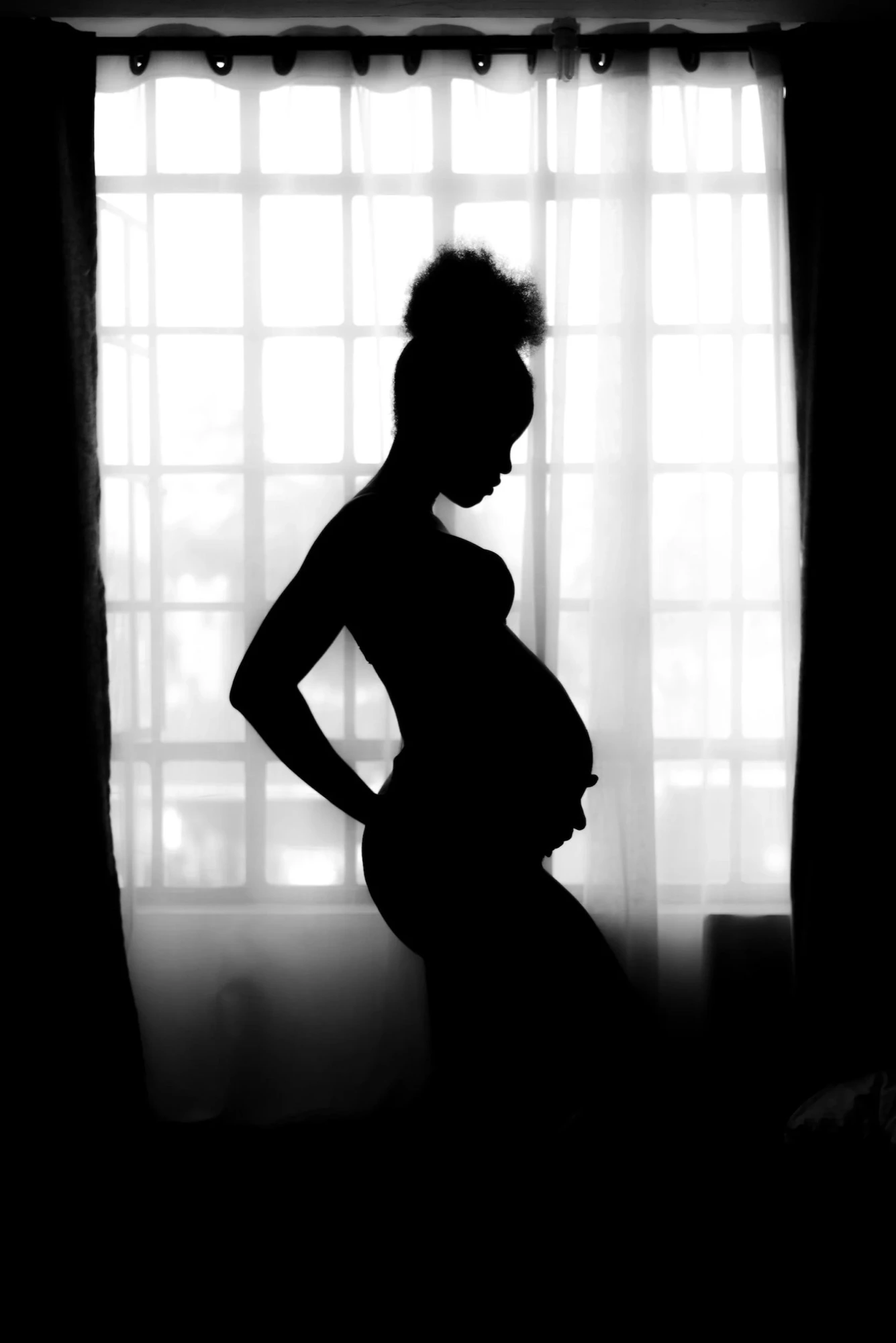 An expectant mother doing a prenatal workout